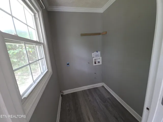 a view of wooden floor in an empty room