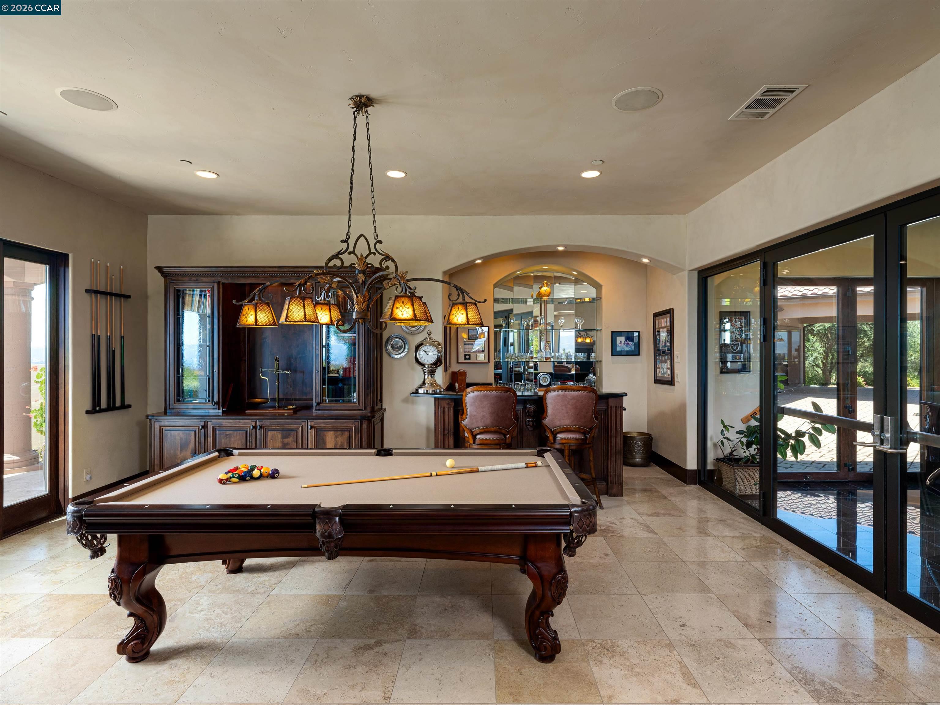 2020 Victorine Road Livermore, CA 94551 - Photo 30 of 99 a living room with furniture a chandelier and a large window