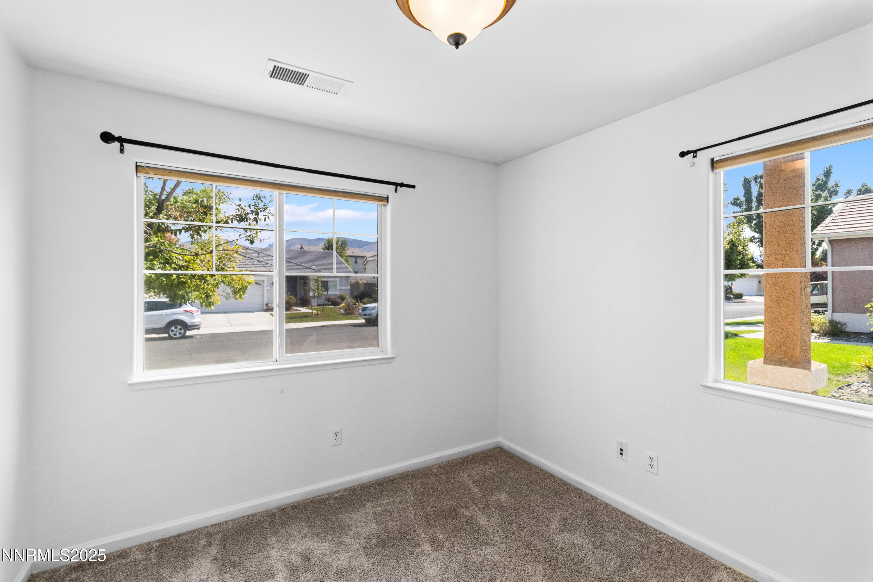 10375 Rosemount Drive Reno, NV 89521 - Photo 24 of 29 a view of an empty room with a window