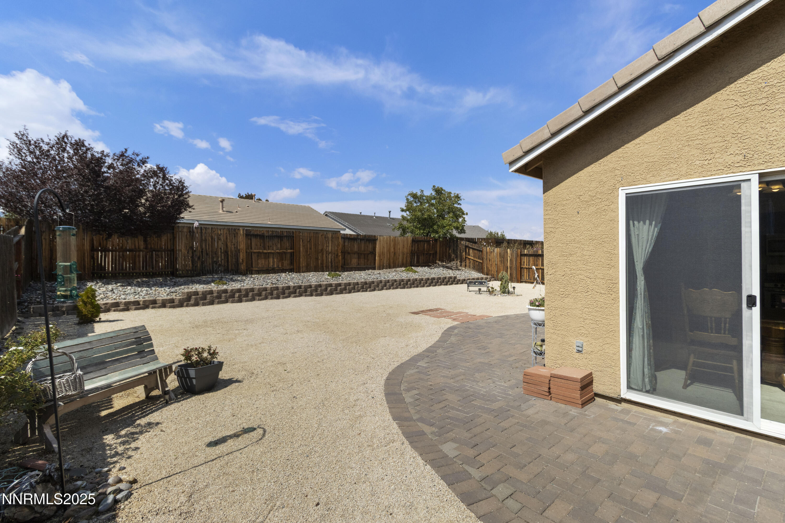 10375 Rosemount Drive Reno, NV 89521 - Photo 29 of 29 a swimming pool with outdoor seating and yard