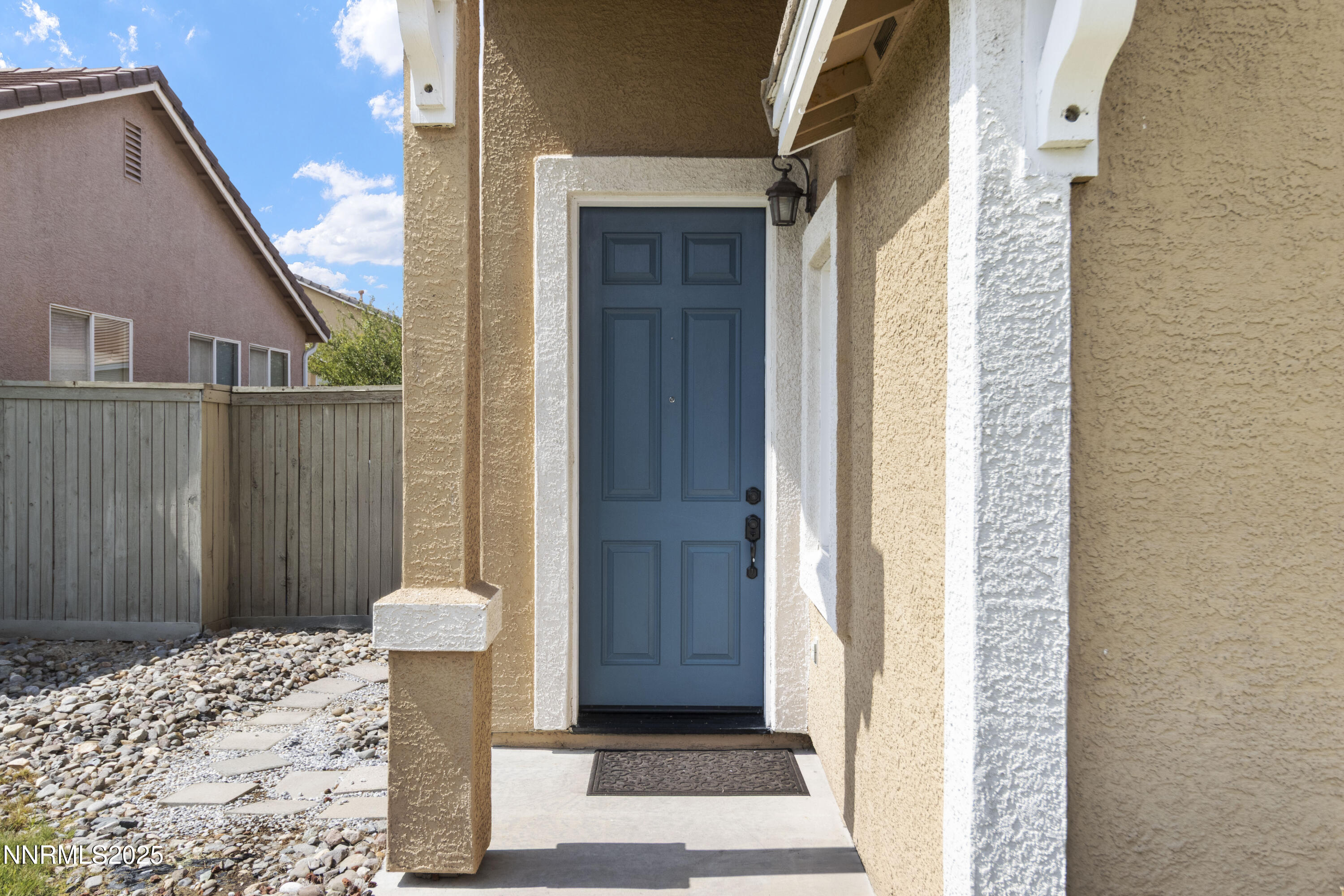 10375 Rosemount Drive Reno, NV 89521 - Photo 4 of 29 a view of a house with a door