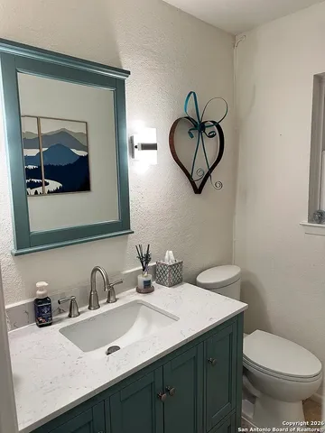 a view of an empty room with stairs