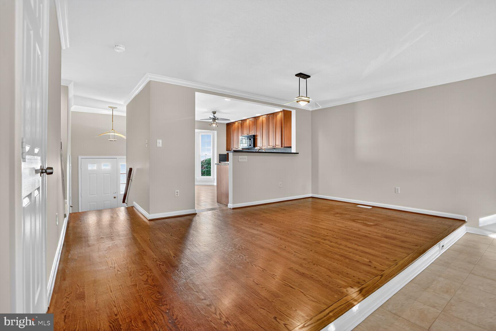 6836 Kerrywood Circle Centreville, VA 20121 - Photo 2 of 22 a view of empty room with wooden floor