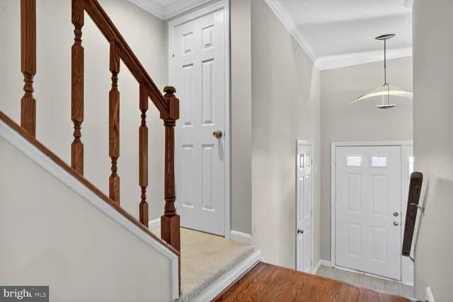 a view of an entryway with staircase