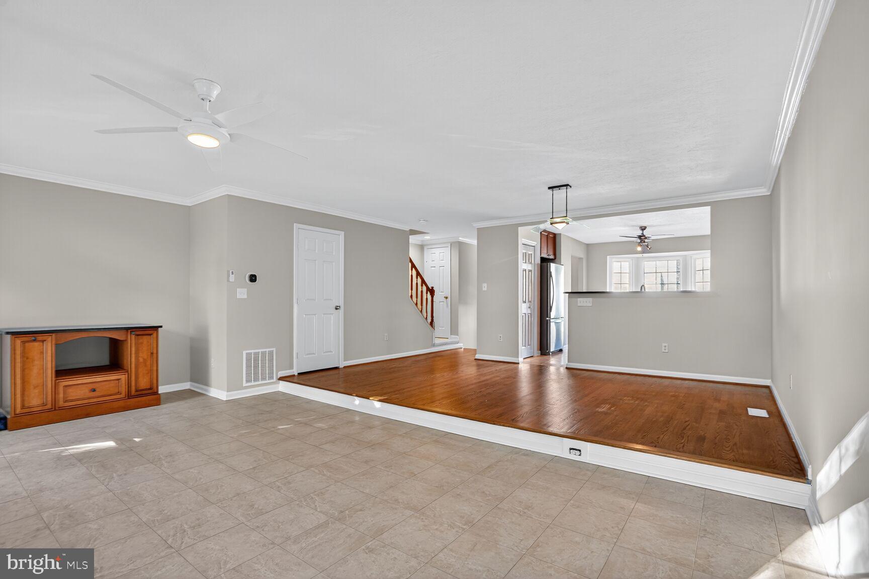 6836 Kerrywood Circle Centreville, VA 20121 - Photo 7 of 22 a view of a livingroom with a fireplace and window