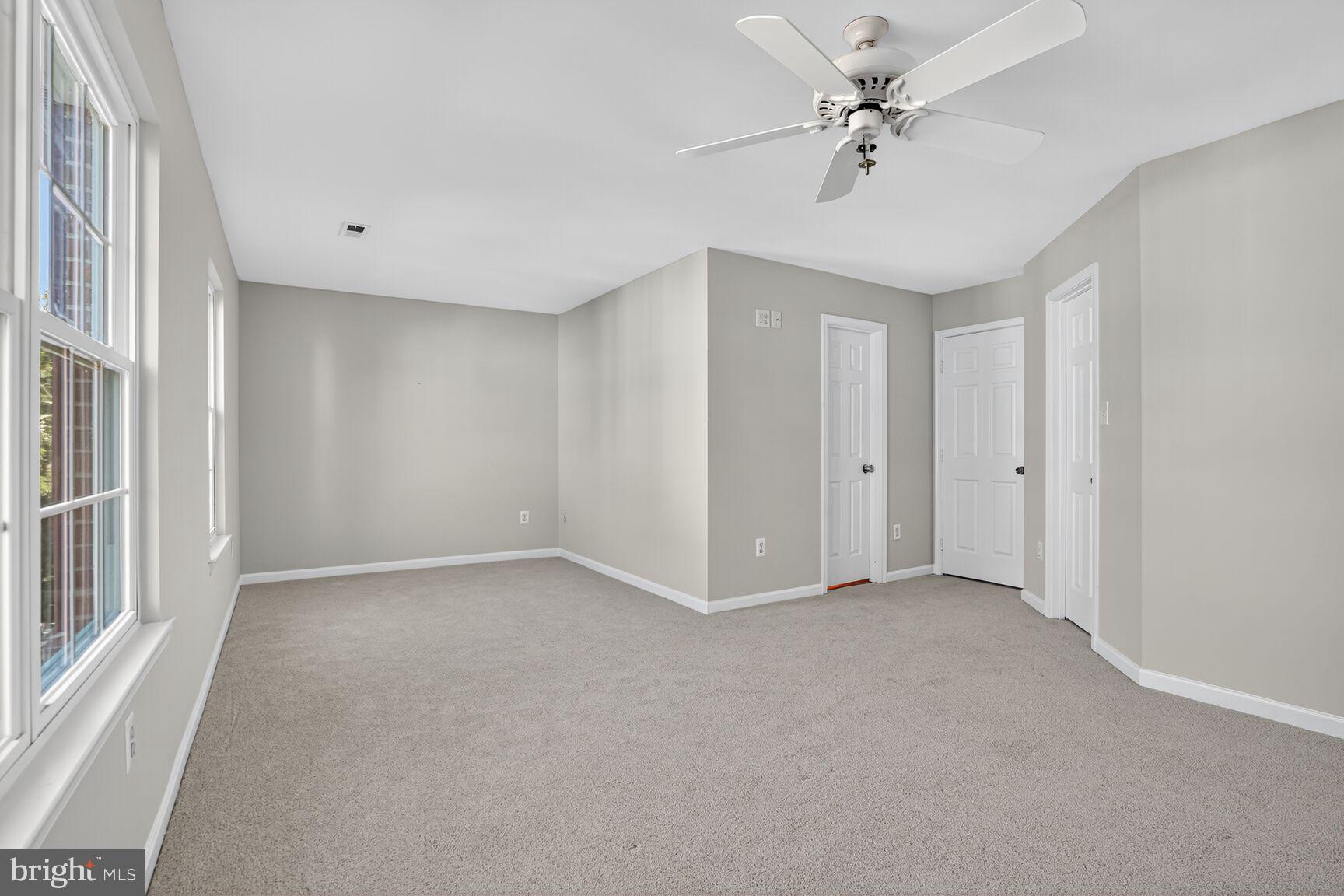 6836 Kerrywood Circle Centreville, VA 20121 - Photo 10 of 22 a view of an empty room with a ceiling fan