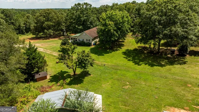 a view of a lake with a yard