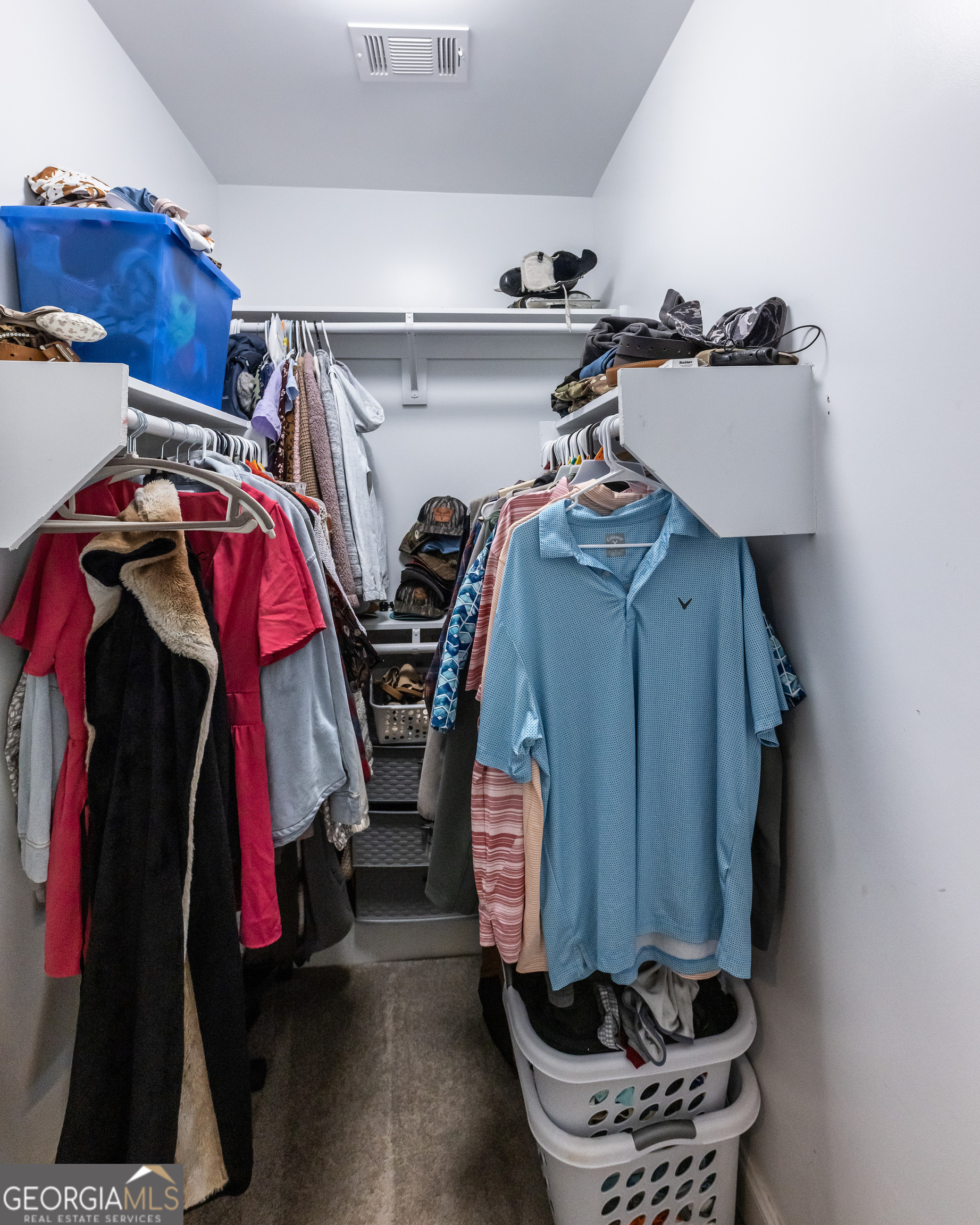 1730 Roland Road Thomaston, GA 30286 - Photo 16 of 55 a view of walk in closet with clothes and shoes