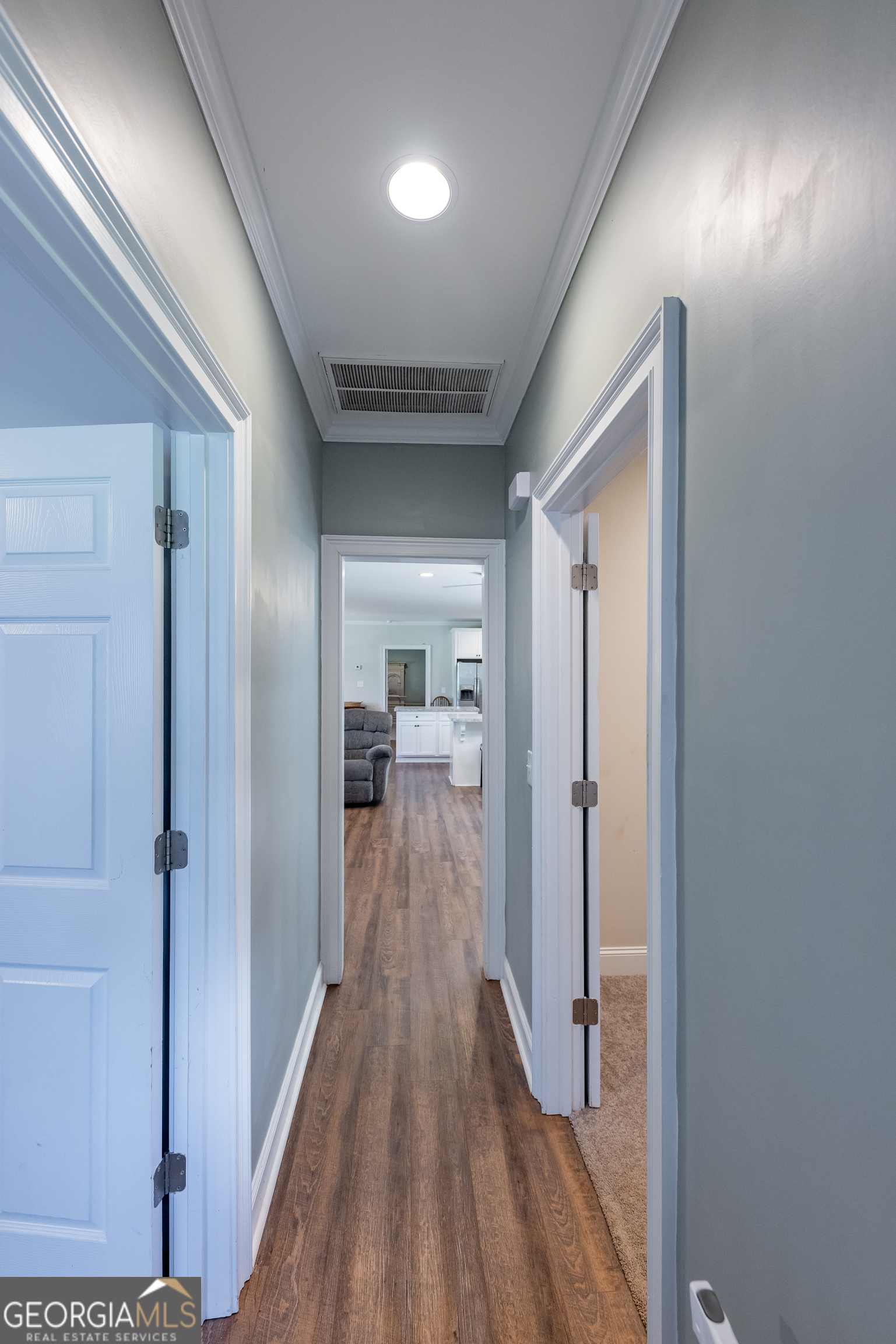 1730 Roland Road Thomaston, GA 30286 - Photo 17 of 55 a view of a hallway with wooden floor