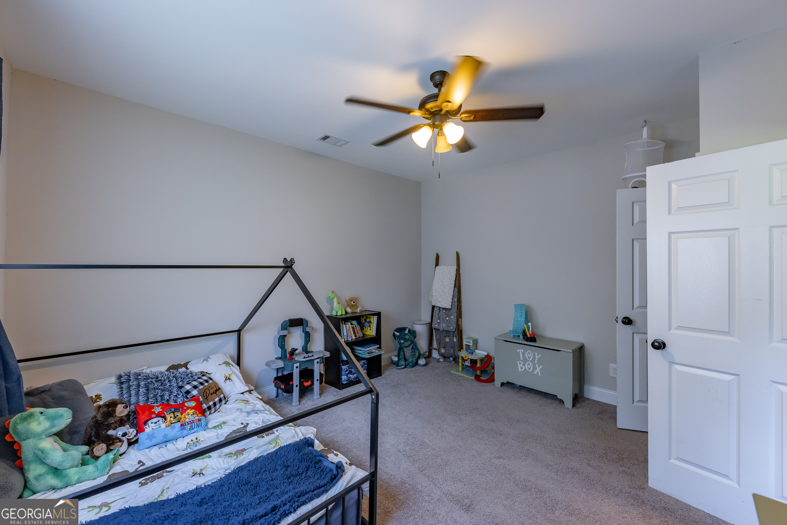 1730 Roland Road Thomaston, GA 30286 - Photo 18 of 55 a view of a dining room with wooden floor and stairs
