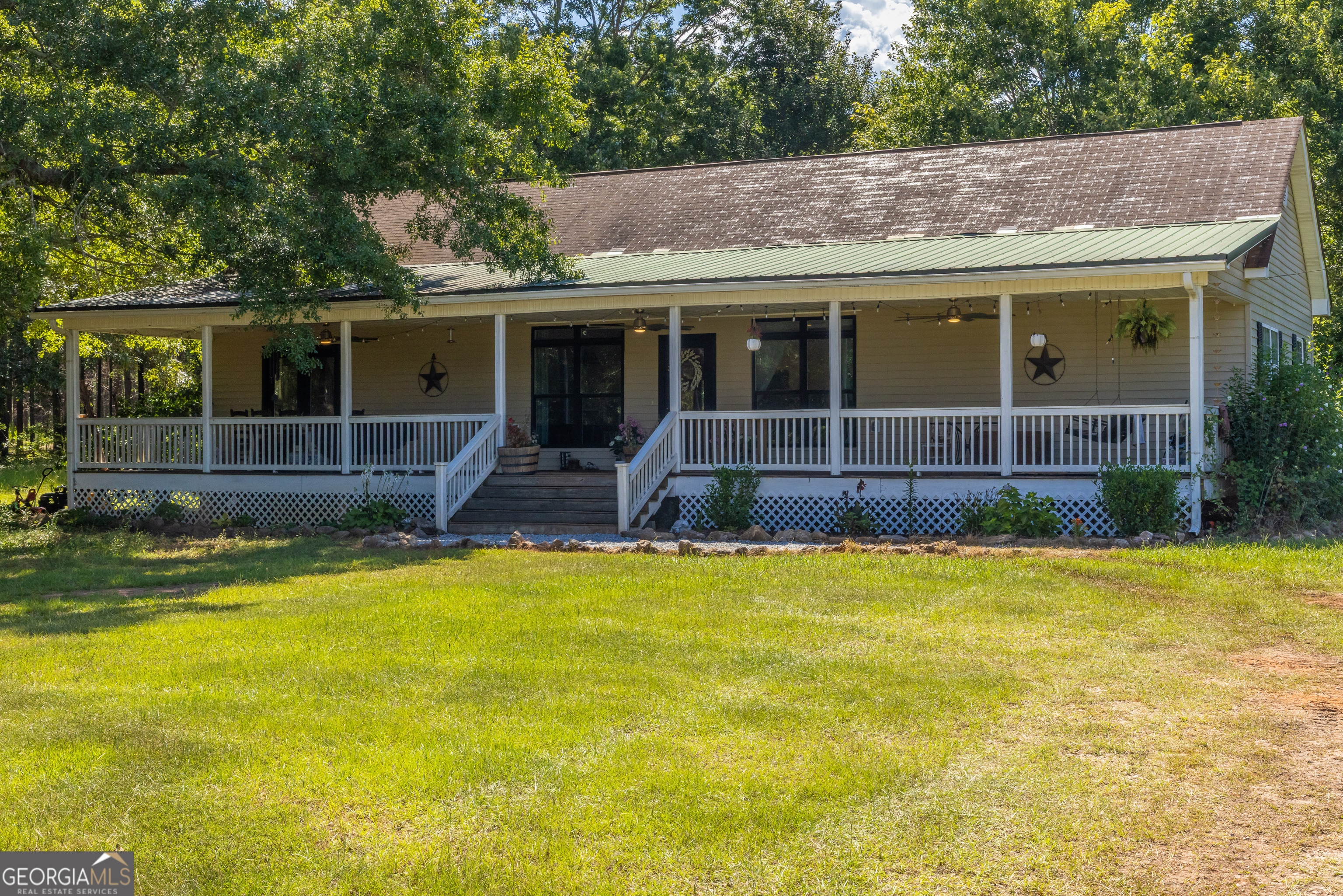 1730 Roland Road Thomaston, GA 30286 - Photo 24 of 55 a view of house with swimming pool and porch