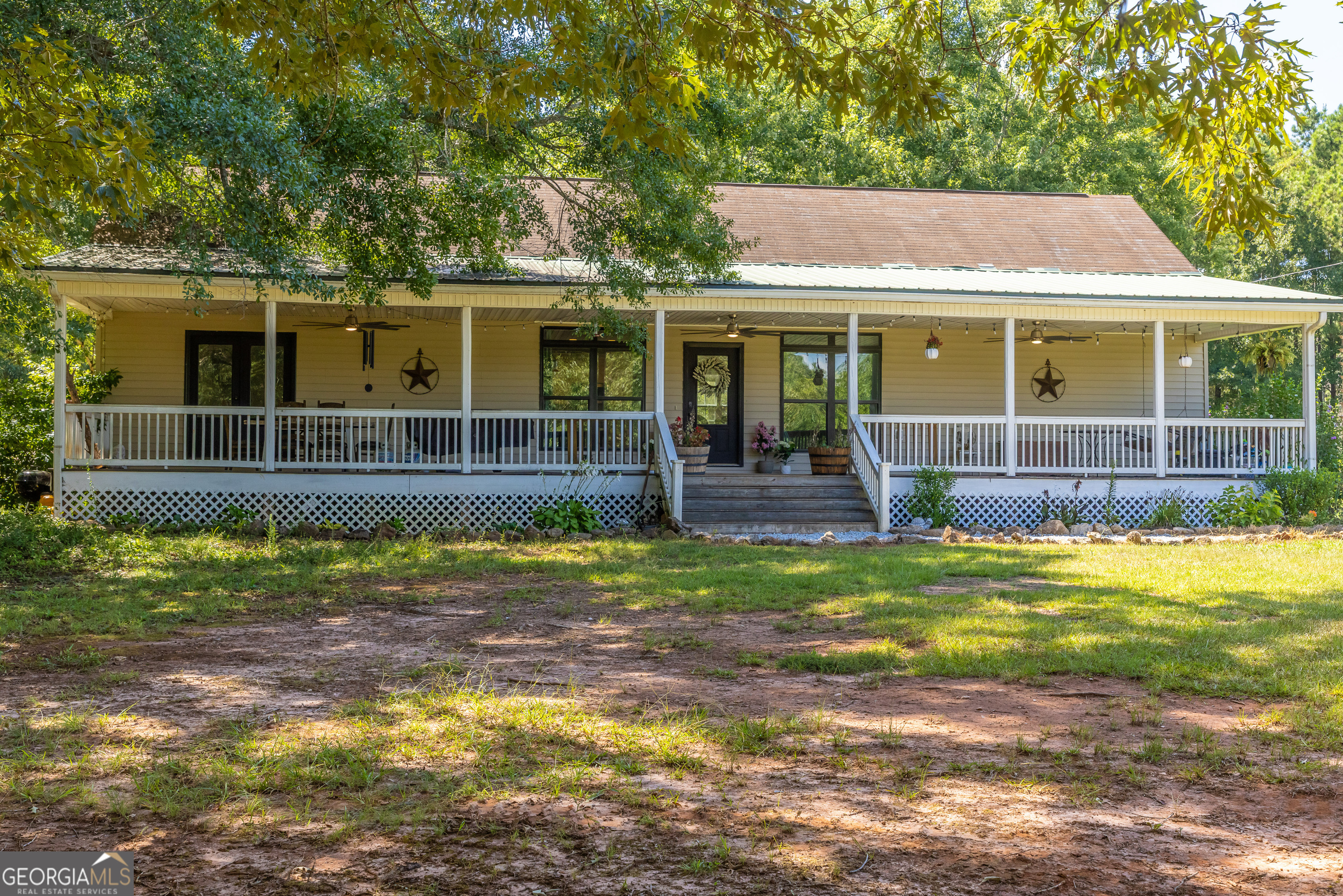1730 Roland Road Thomaston, GA 30286 - Photo 25 of 55 a view of a house with backyard and sitting area