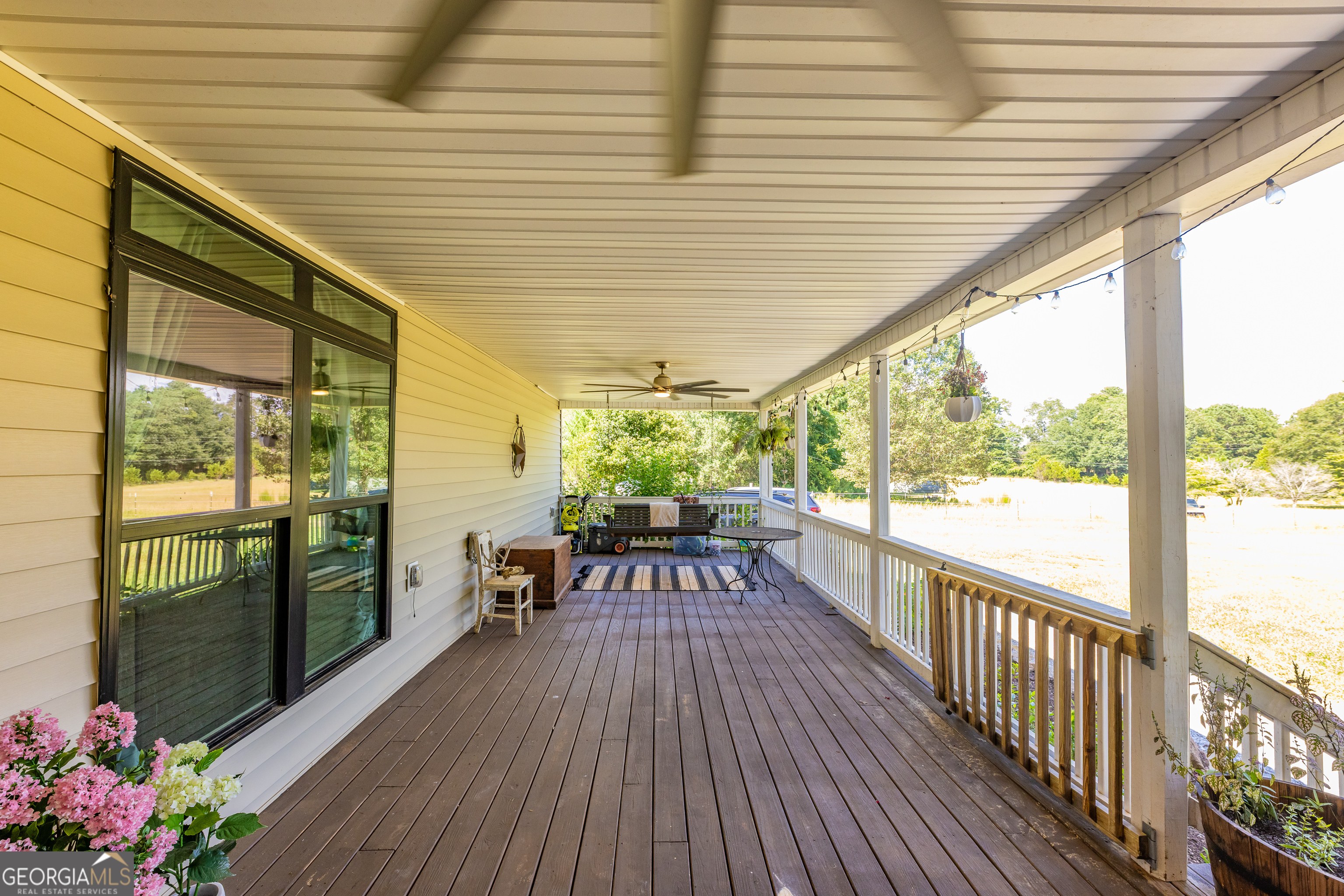1730 Roland Road Thomaston, GA 30286 - Photo 4 of 55 a view of a patio with wooden floor