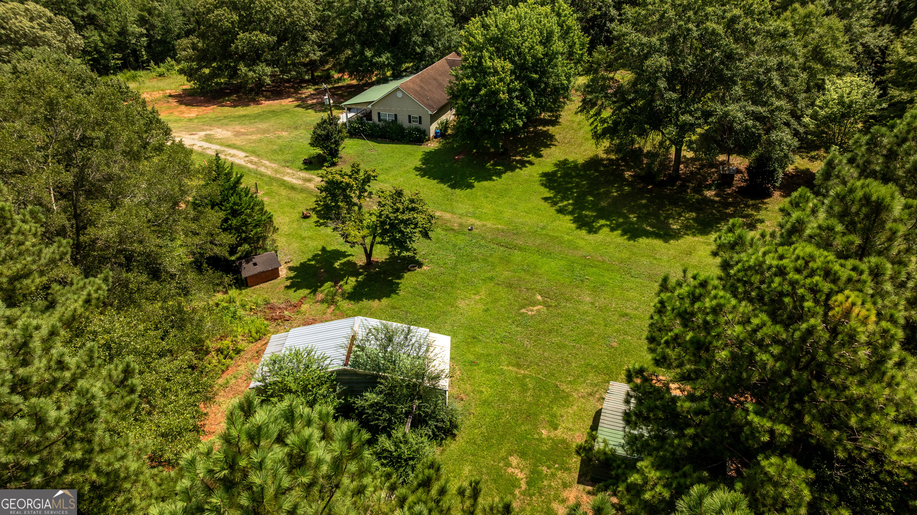 1730 Roland Road Thomaston, GA 30286 - Photo 43 of 55 a view of a lake with a tree