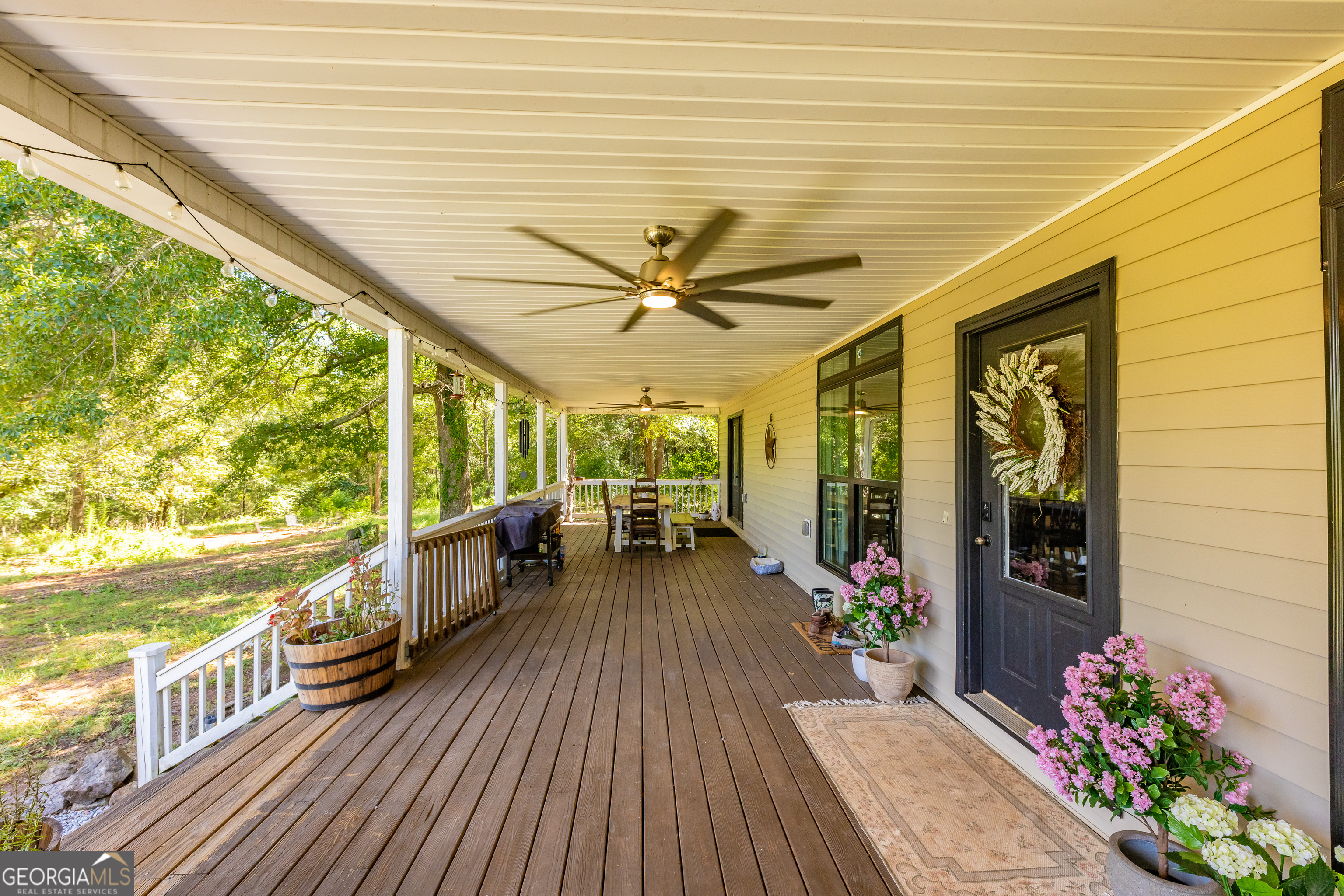 1730 Roland Road Thomaston, GA 30286 - Photo 5 of 55 a view of a balcony with chairs