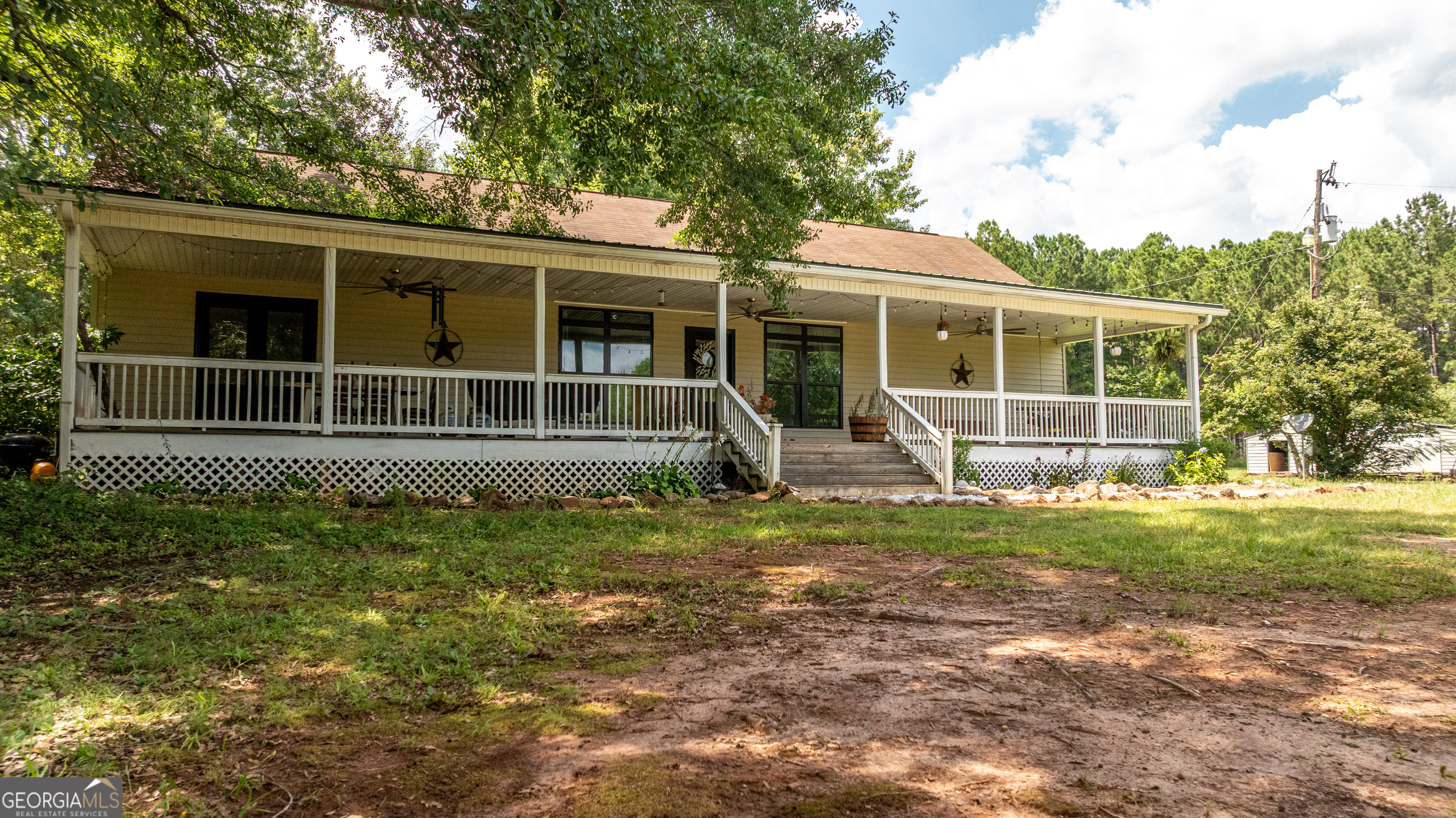 1730 Roland Road Thomaston, GA 30286 - Photo 51 of 55 a view of a house with yard and a large tree