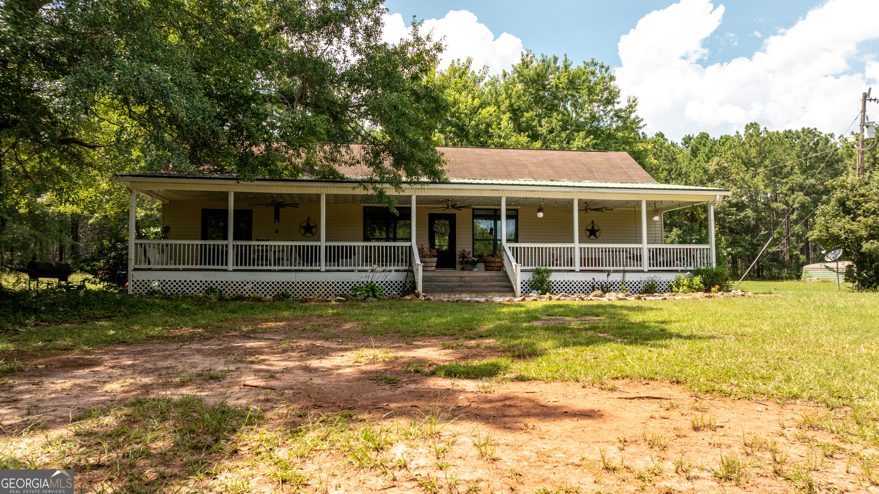 1730 Roland Road Thomaston, GA 30286 - Photo 52 of 55 a view of a house with backyard and trees