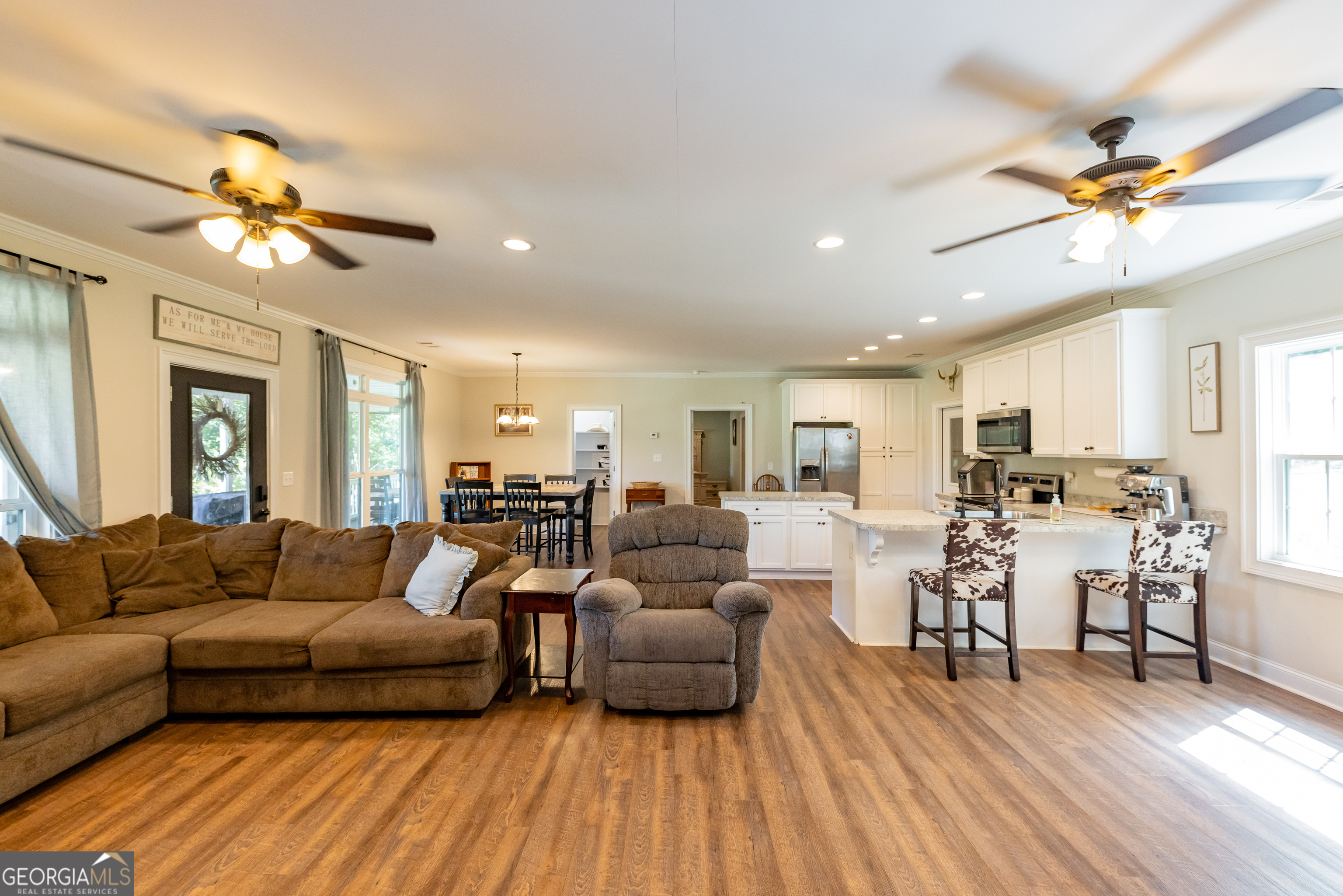 1730 Roland Road Thomaston, GA 30286 - Photo 7 of 55 a living room with furniture and wooden floor