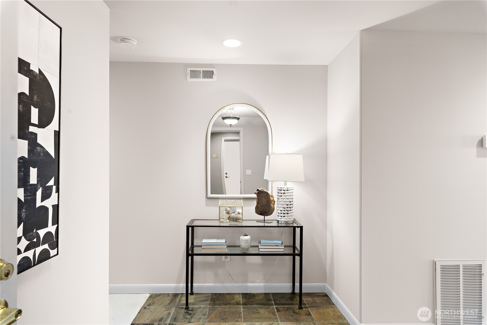 1300 Alki Avenue Southwest, Unit 200 Seattle, WA 98116 - Photo 16 of 32 a bathroom with a sink and a mirror