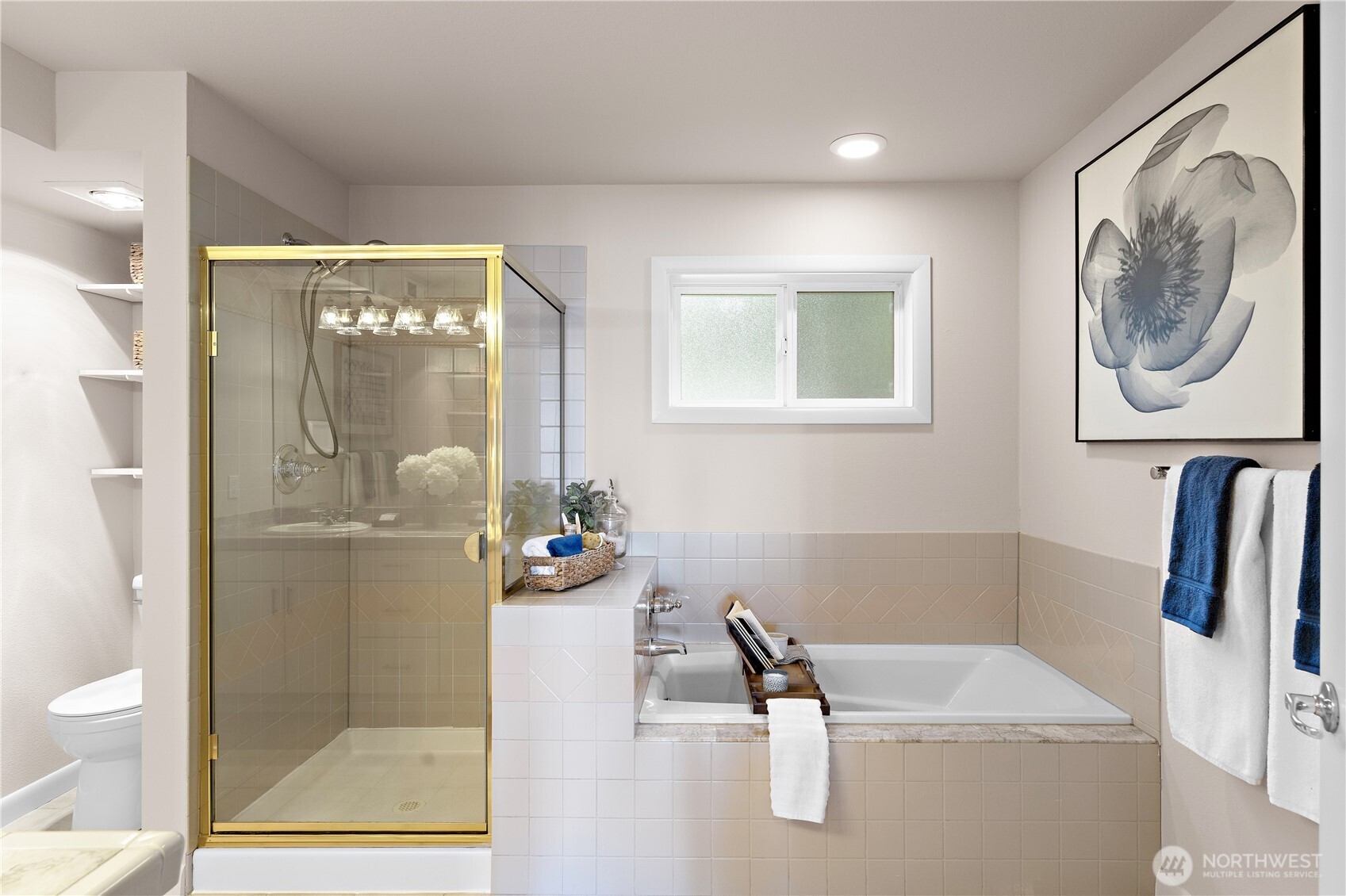 1300 Alki Avenue Southwest, Unit 200 Seattle, WA 98116 - Photo 20 of 32 a bathroom with a sink a toilet and shower