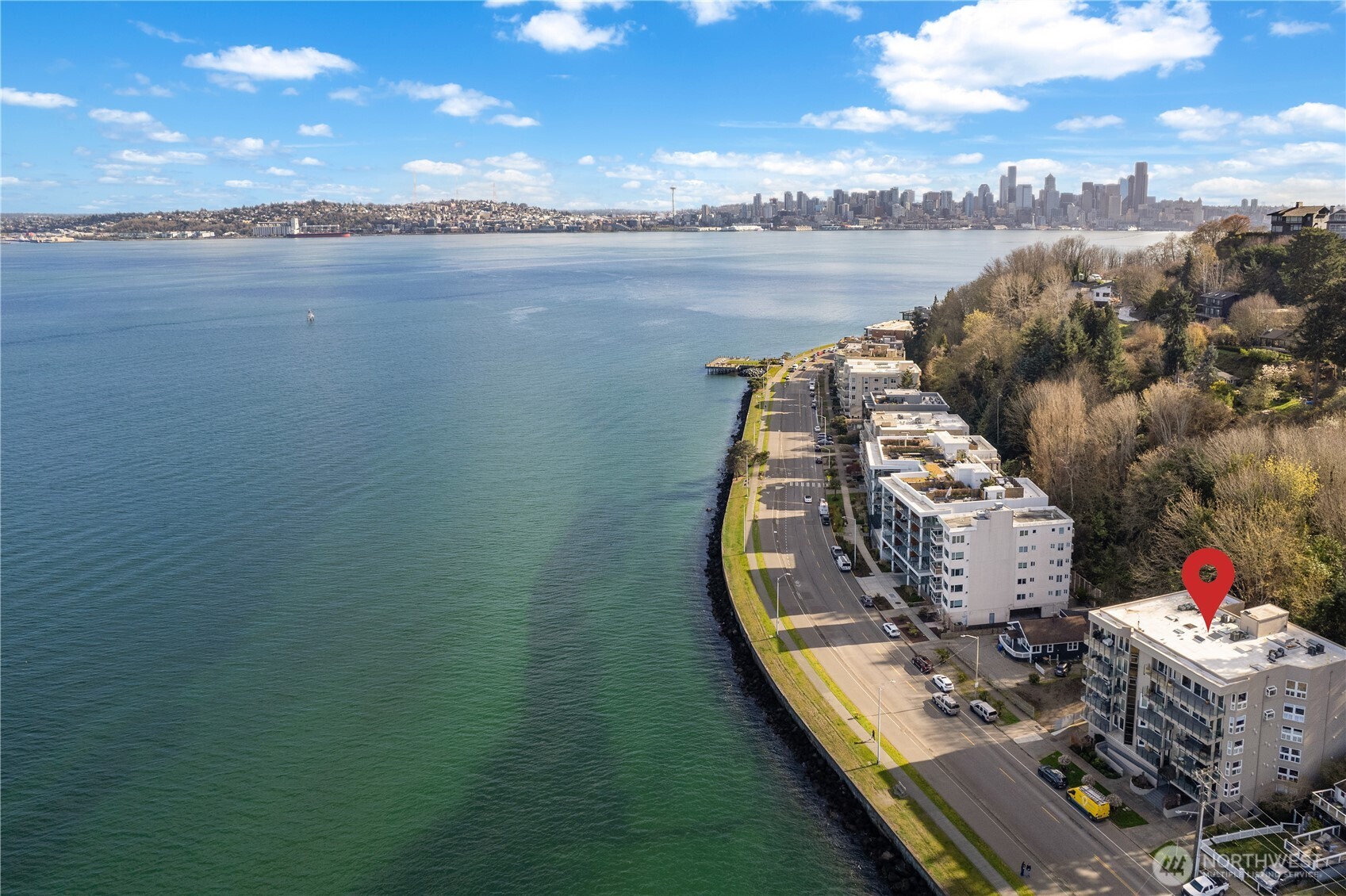 1300 Alki Avenue Southwest, Unit 200 Seattle, WA 98116 - Photo 31 of 32 a view of a lake in middle of the house