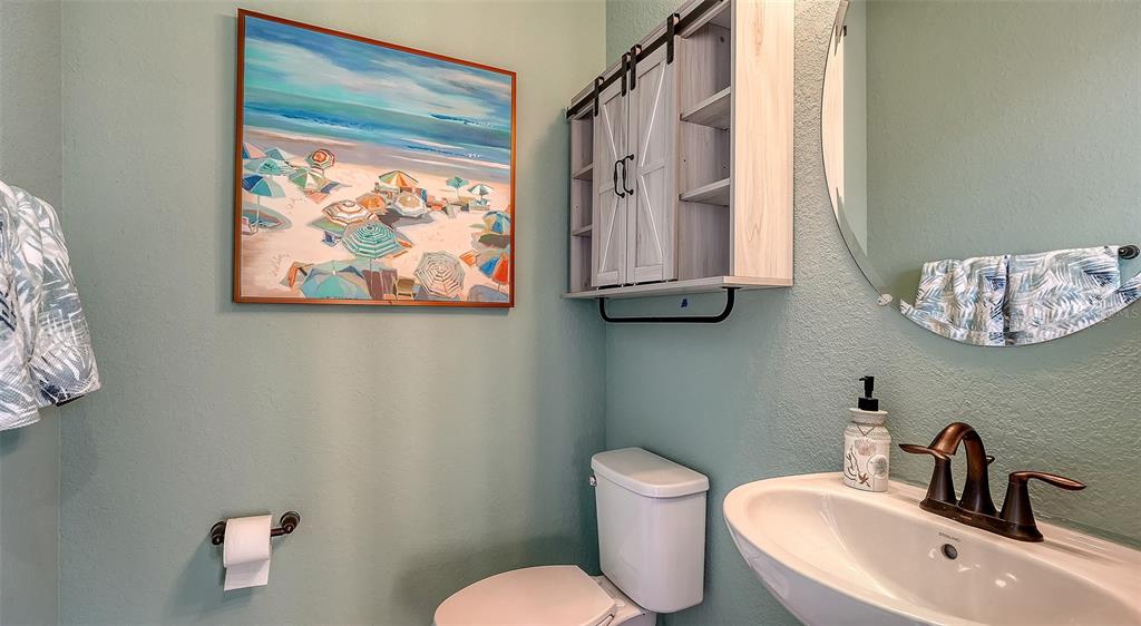 5914 Cessna Run Lakewood Ranch, FL 34211 - Photo 40 of 92 a bathroom with a toilet and a sink