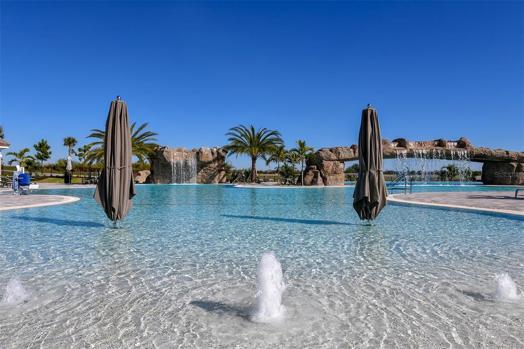 5914 Cessna Run Lakewood Ranch, FL 34211 - Photo 77 of 92 a view of a yard with a slide