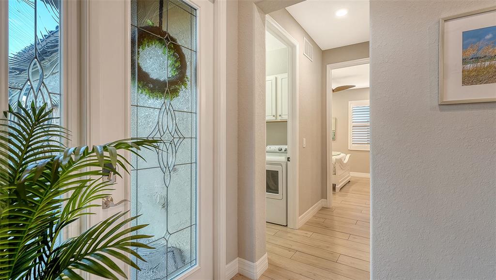 5914 Cessna Run Lakewood Ranch, FL 34211 - Photo 8 of 92 a view of a walk in closet with wooden floor