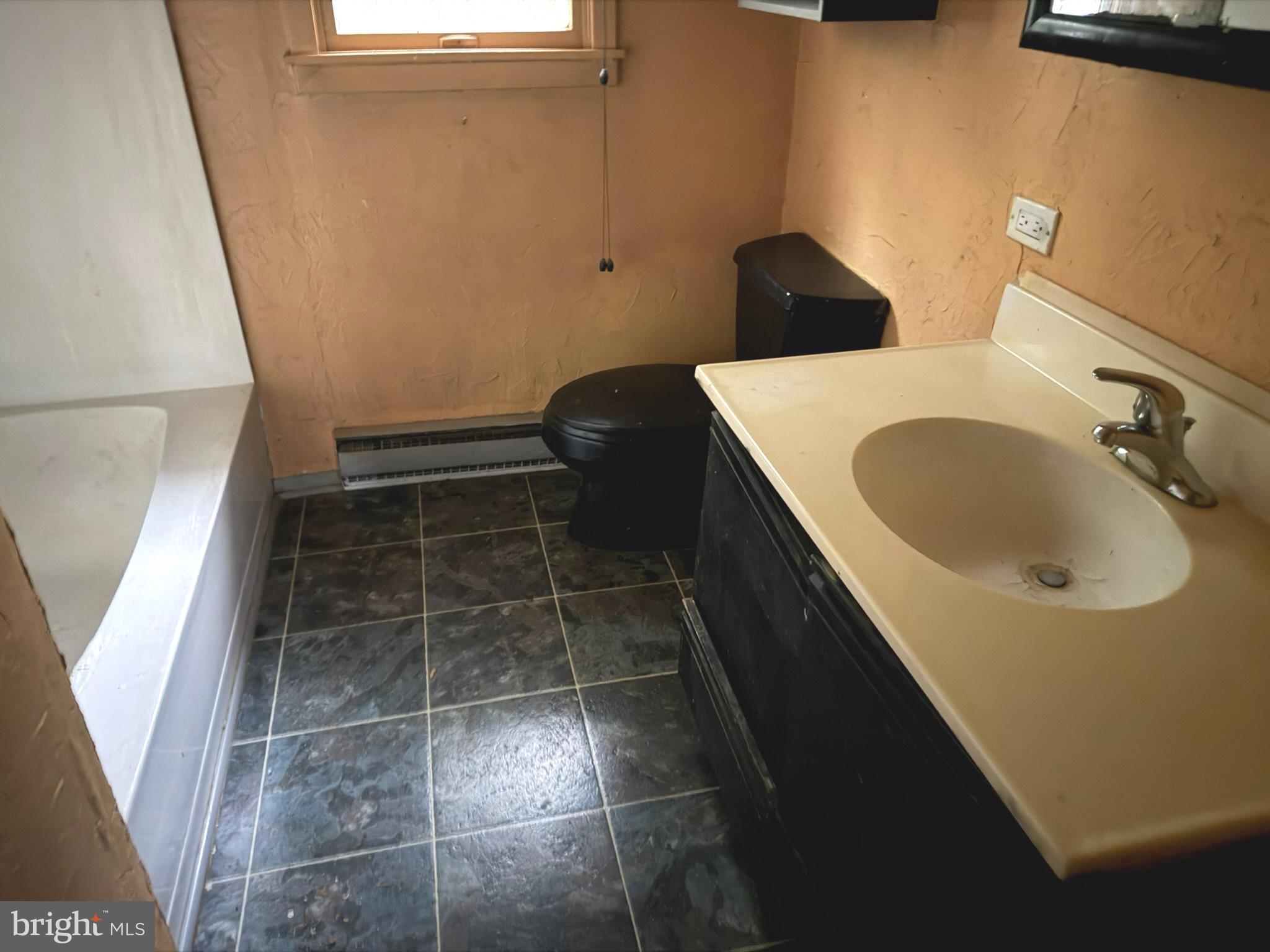 112 Strawberry Way Rehoboth Beach, DE 19971 - Photo 14 of 14 a bathroom with a sink and toilet