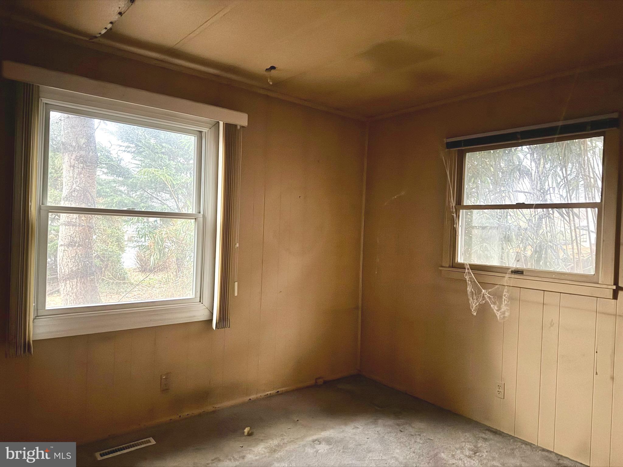 112 Strawberry Way Rehoboth Beach, DE 19971 - Photo 10 of 14 an empty room with a window