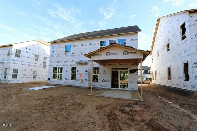 a view of a building with a street