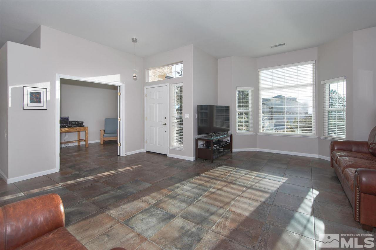 1184 University Ridge Drive Reno, NV 89512 - Photo 2 of 25 a view of livingroom with furniture and window