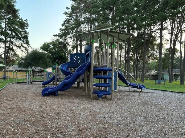 a view of a park with slide