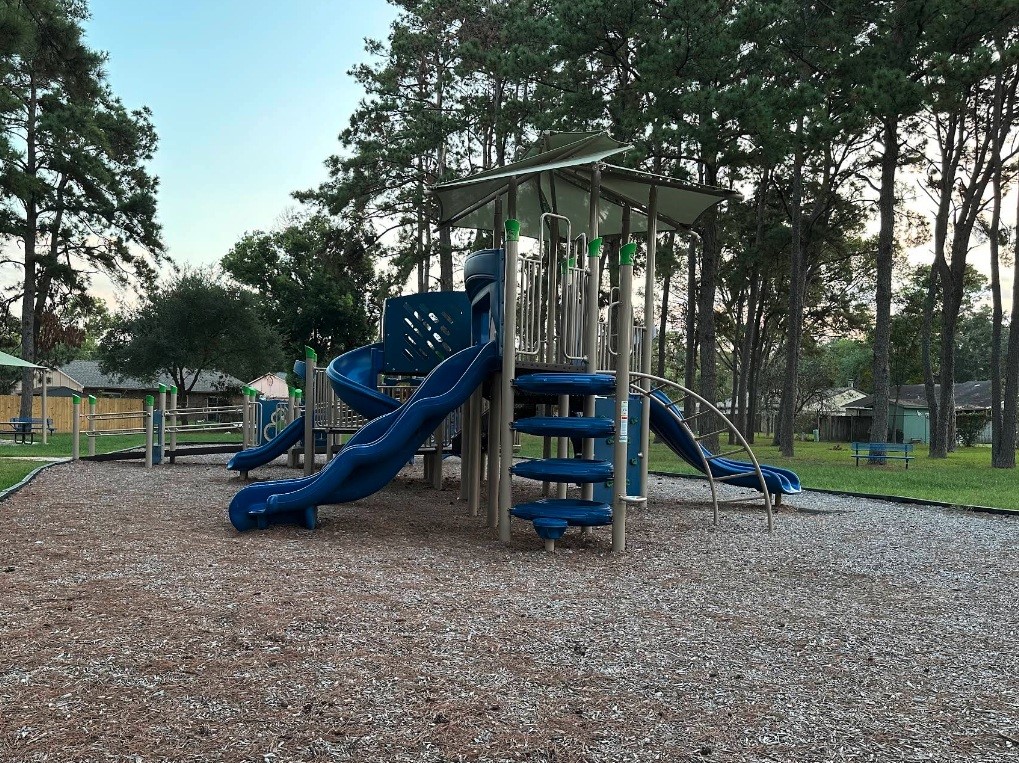 2911 Hummingbird Lane Humble, TX 77396 - Photo 6 of 6 a view of a park with slide