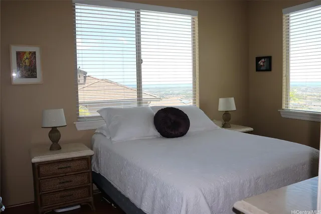 a bedroom with a bed and a table in it