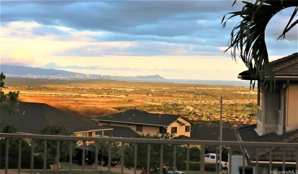 a view of a city with an ocean