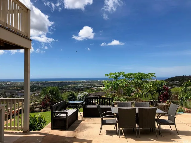 a view of a terrace with furniture