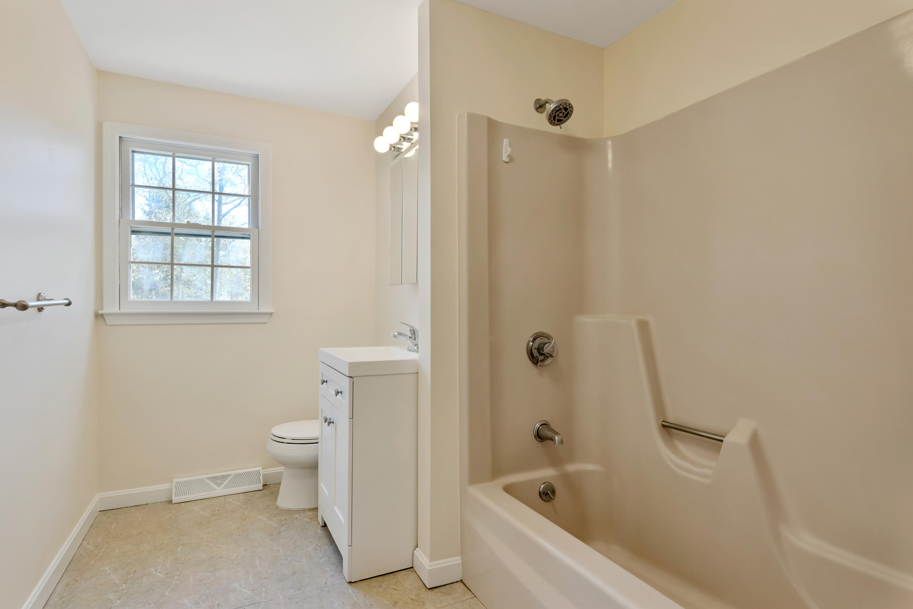 43 Valley Brook Road Centerville, MA 02632 - Photo 14 of 21 a bathroom with a bathtub toilet and shower