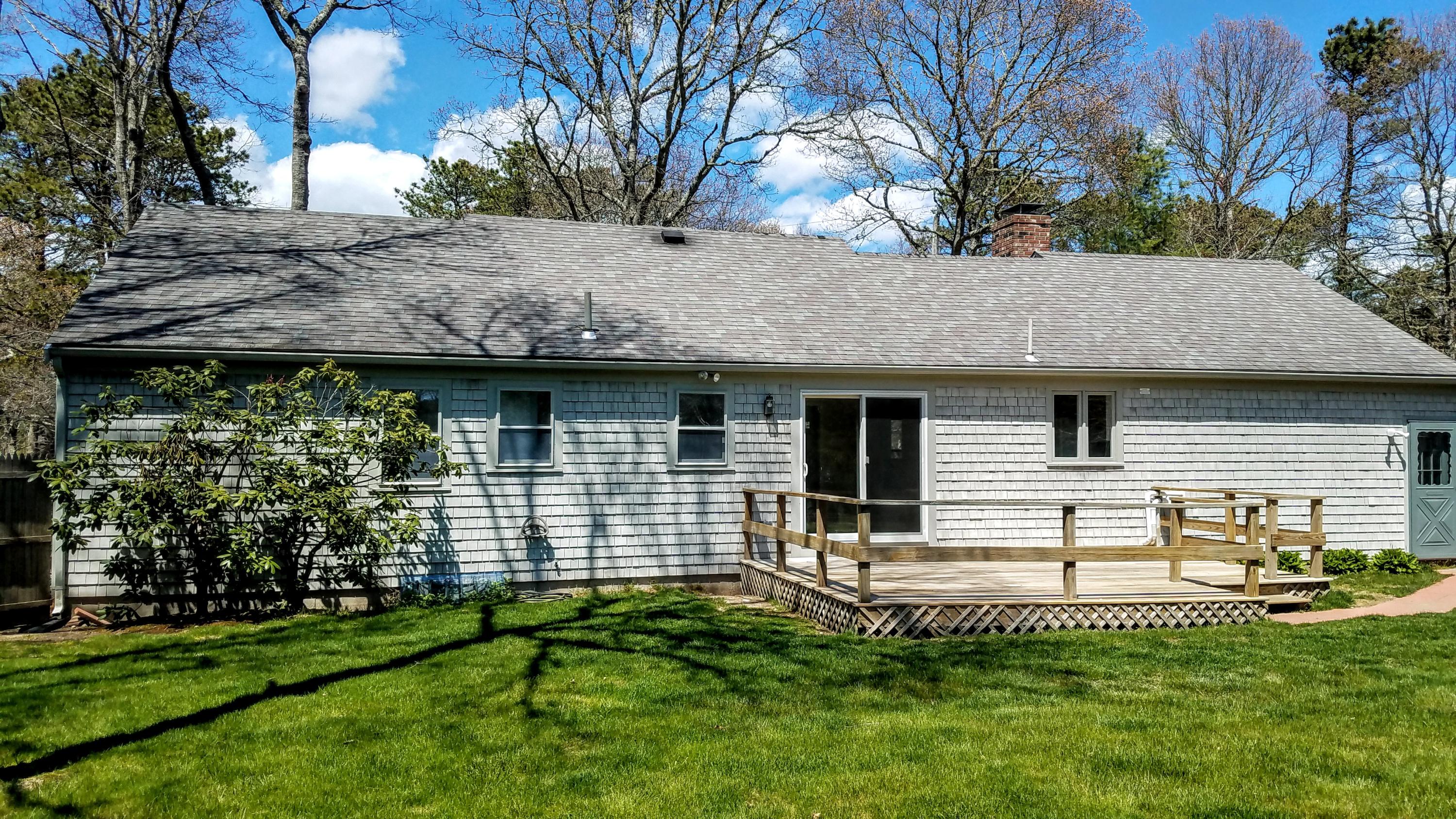 43 Valley Brook Road Centerville, MA 02632 - Photo 3 of 21 a view of a house with a yard