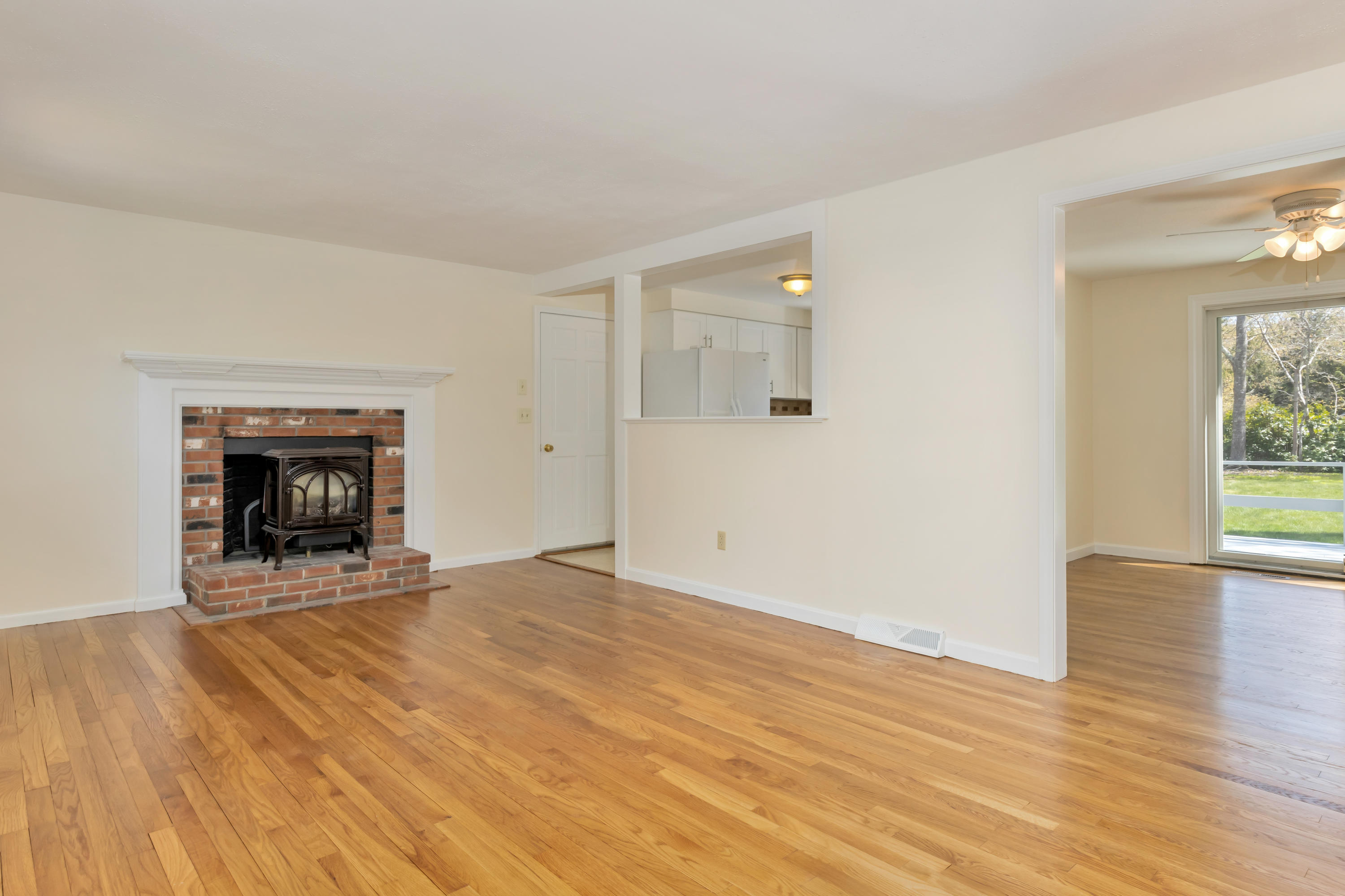 43 Valley Brook Road Centerville, MA 02632 - Photo 9 of 21 a view of an empty room with wooden floor and a window