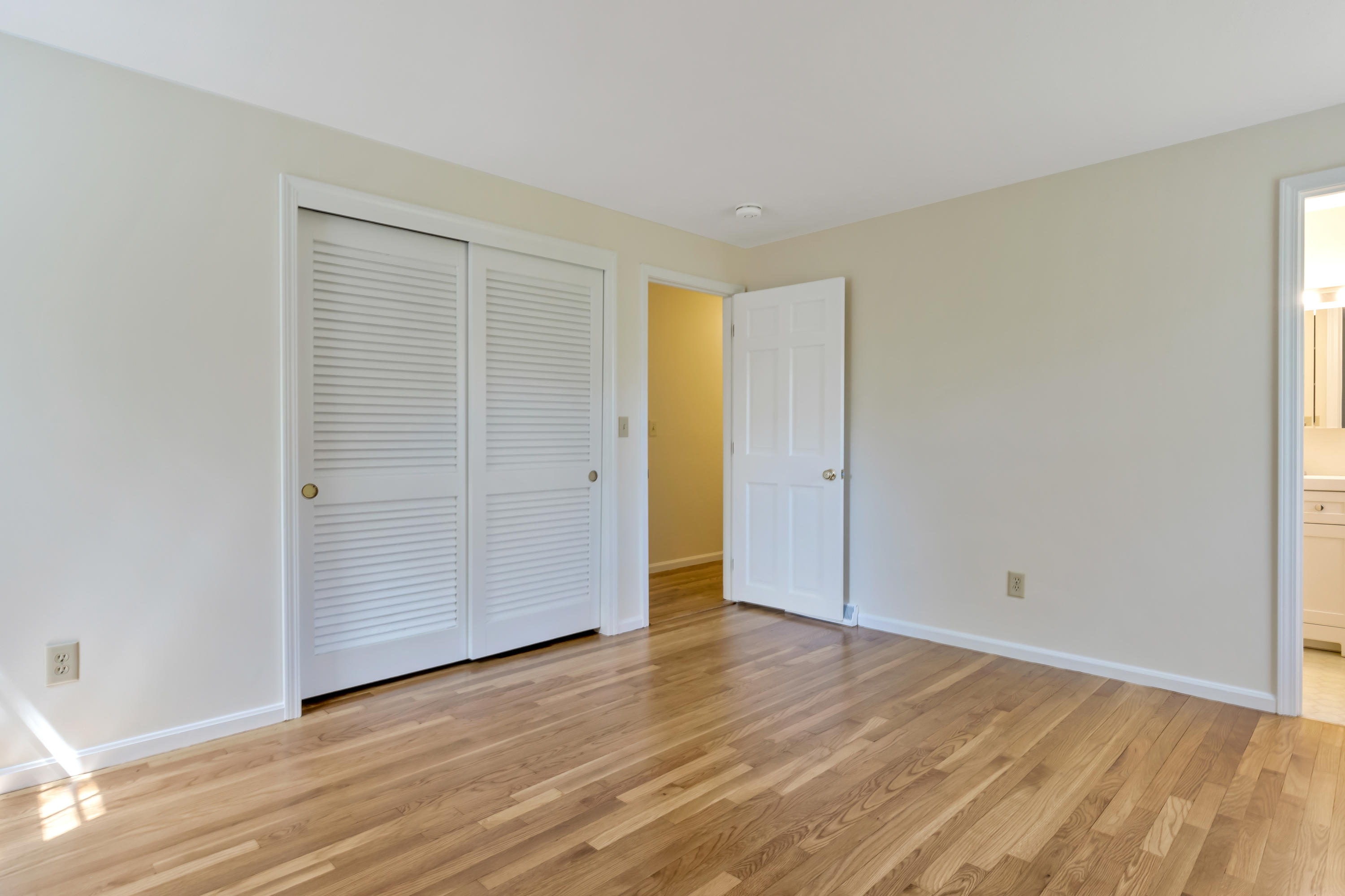 43 Valley Brook Road Centerville, MA 02632 - Photo 10 of 21 an empty room with wooden floor