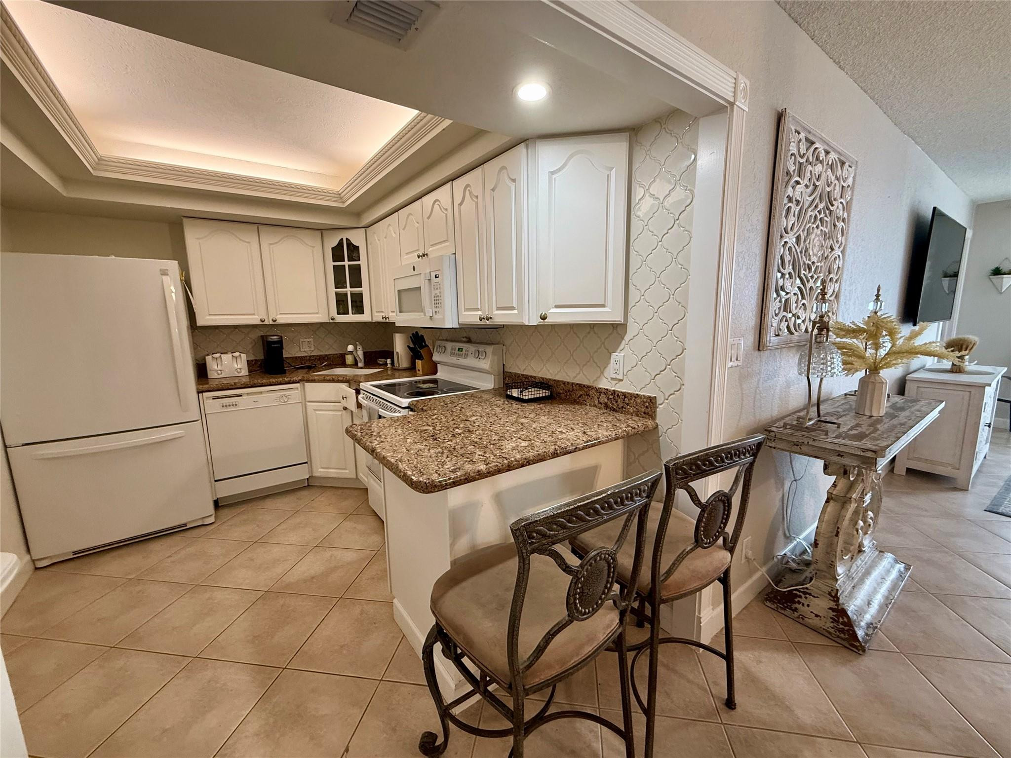 101 Briny Avenue, Unit 2604 Pompano Beach, FL 33062 - Photo 7 of 31 Updated kitchen