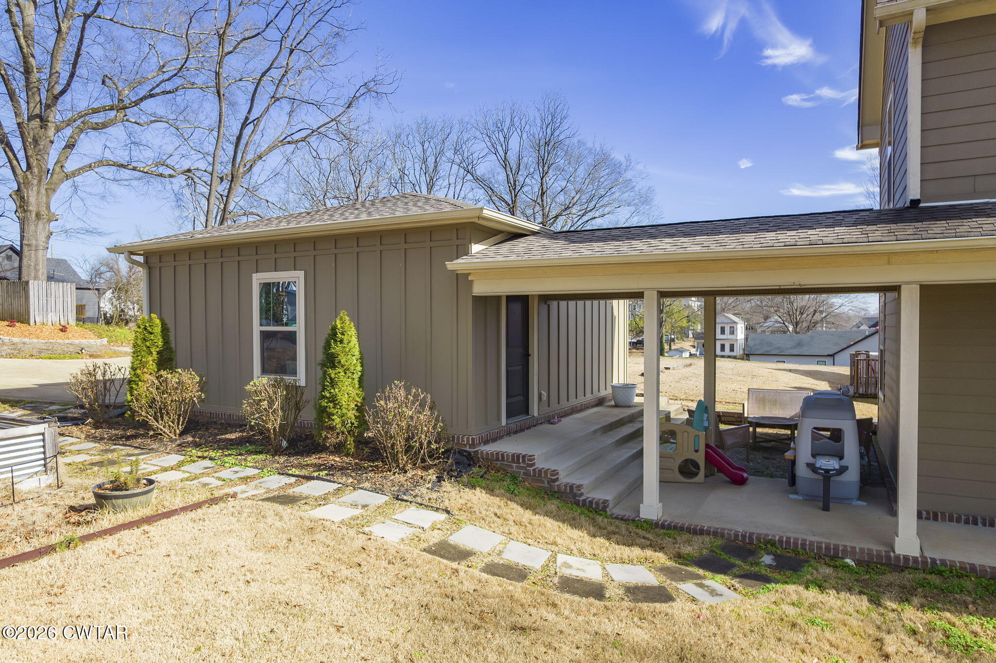 223 Morgan Street Jackson, TN 38301 - Photo 26 of 39 a view of a house with backyard porch and furniture