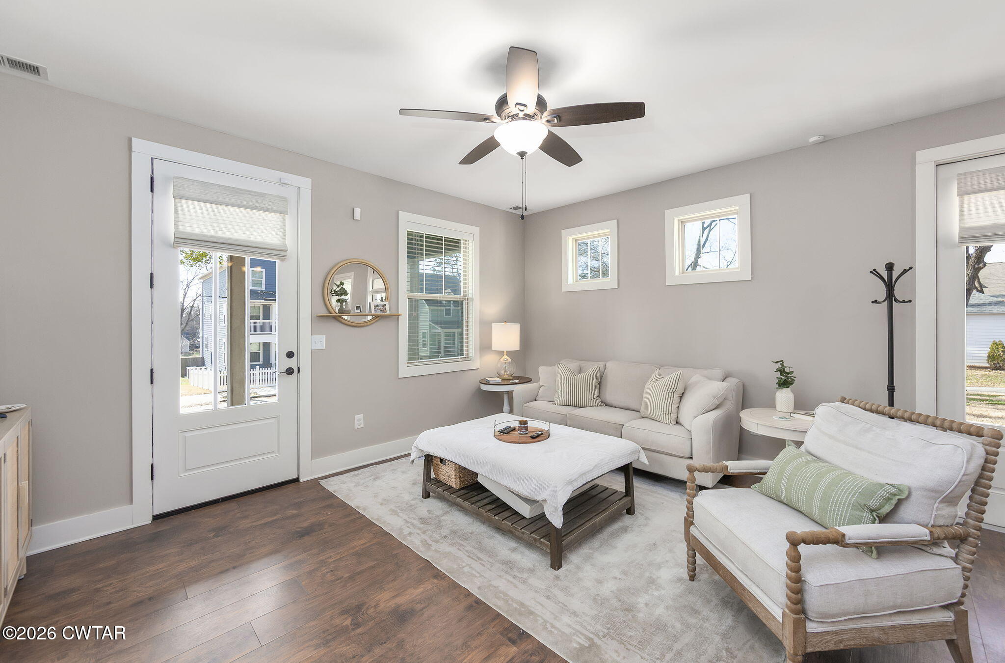 223 Morgan Street Jackson, TN 38301 - Photo 5 of 39 a living room with furniture and a chandelier