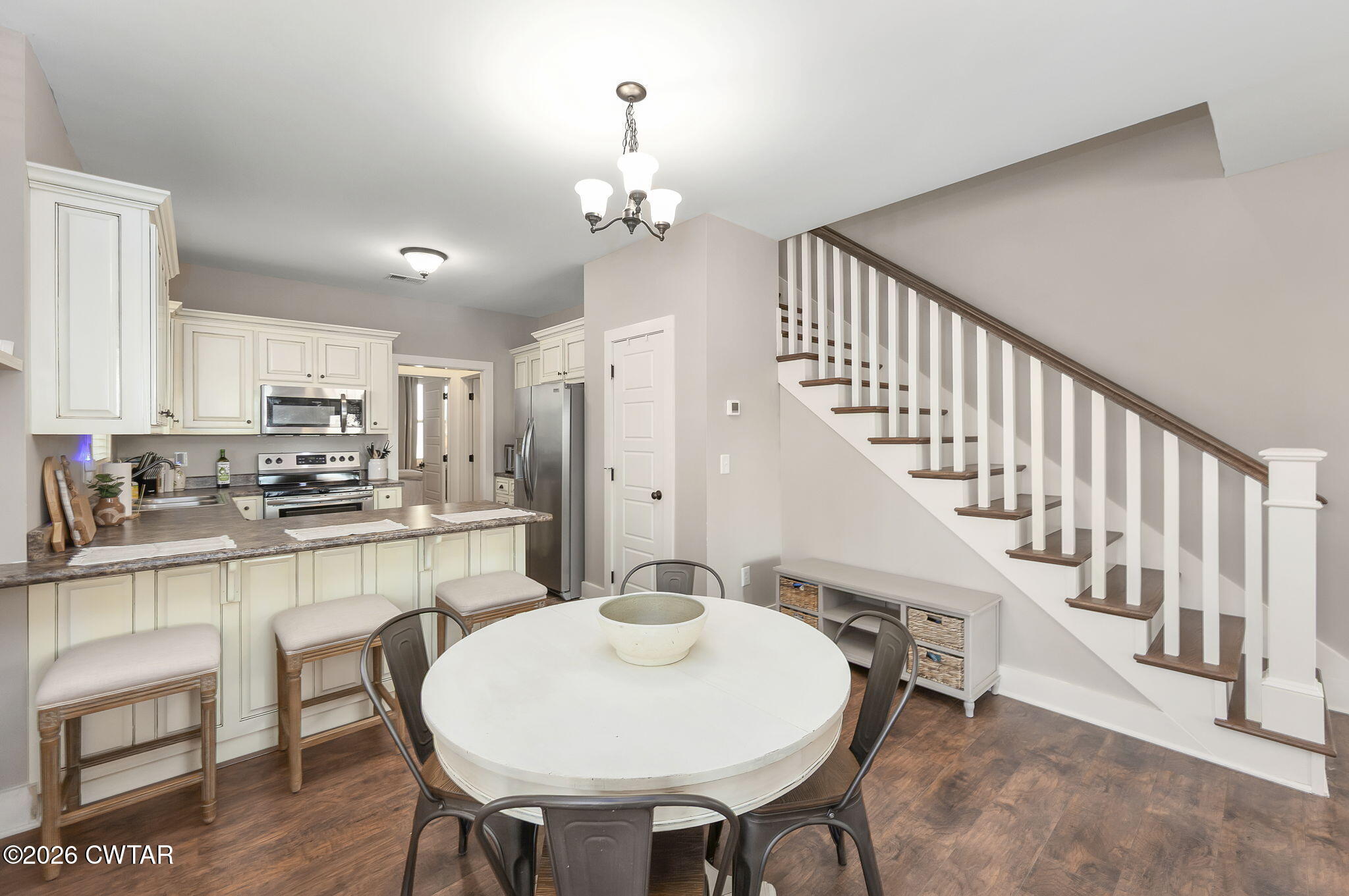 223 Morgan Street Jackson, TN 38301 - Photo 8 of 39 a very nice looking dining room with wooden floor and chairs