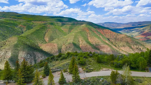 a view of lake with mountain
