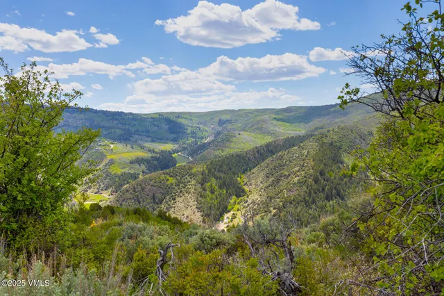 a view of lake view with mountain