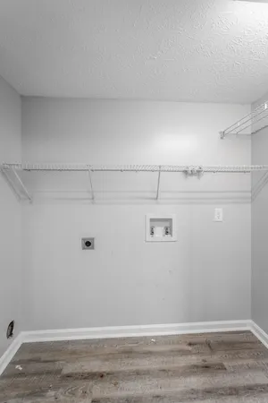 a view of a room with racks on the wall