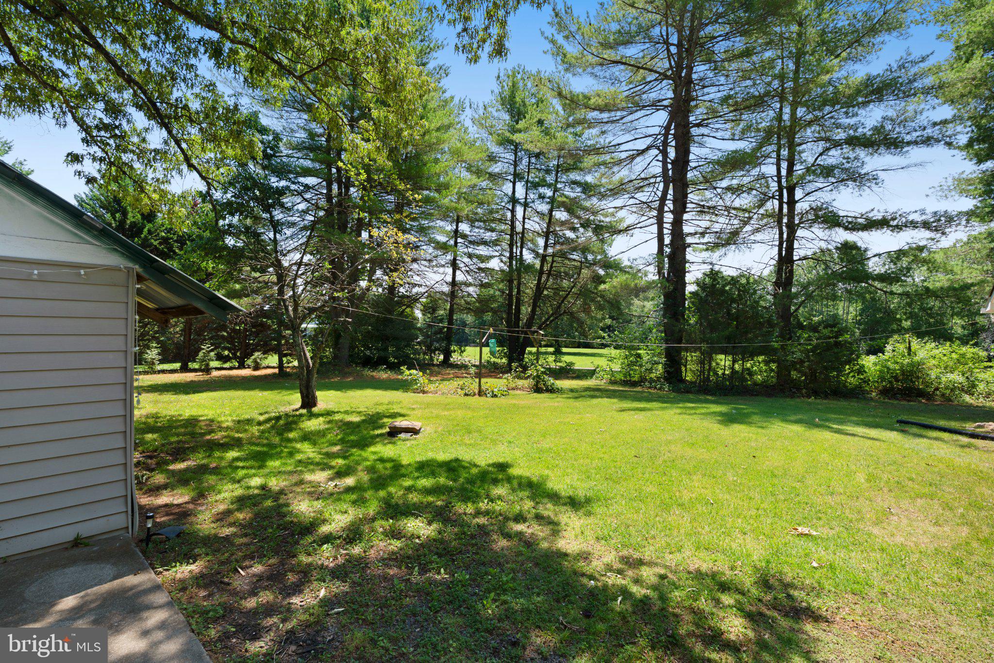 8405 Shirley Road Spotsylvania, VA 22551 - Photo 36 of 42 a view of a backyard with swimming pool