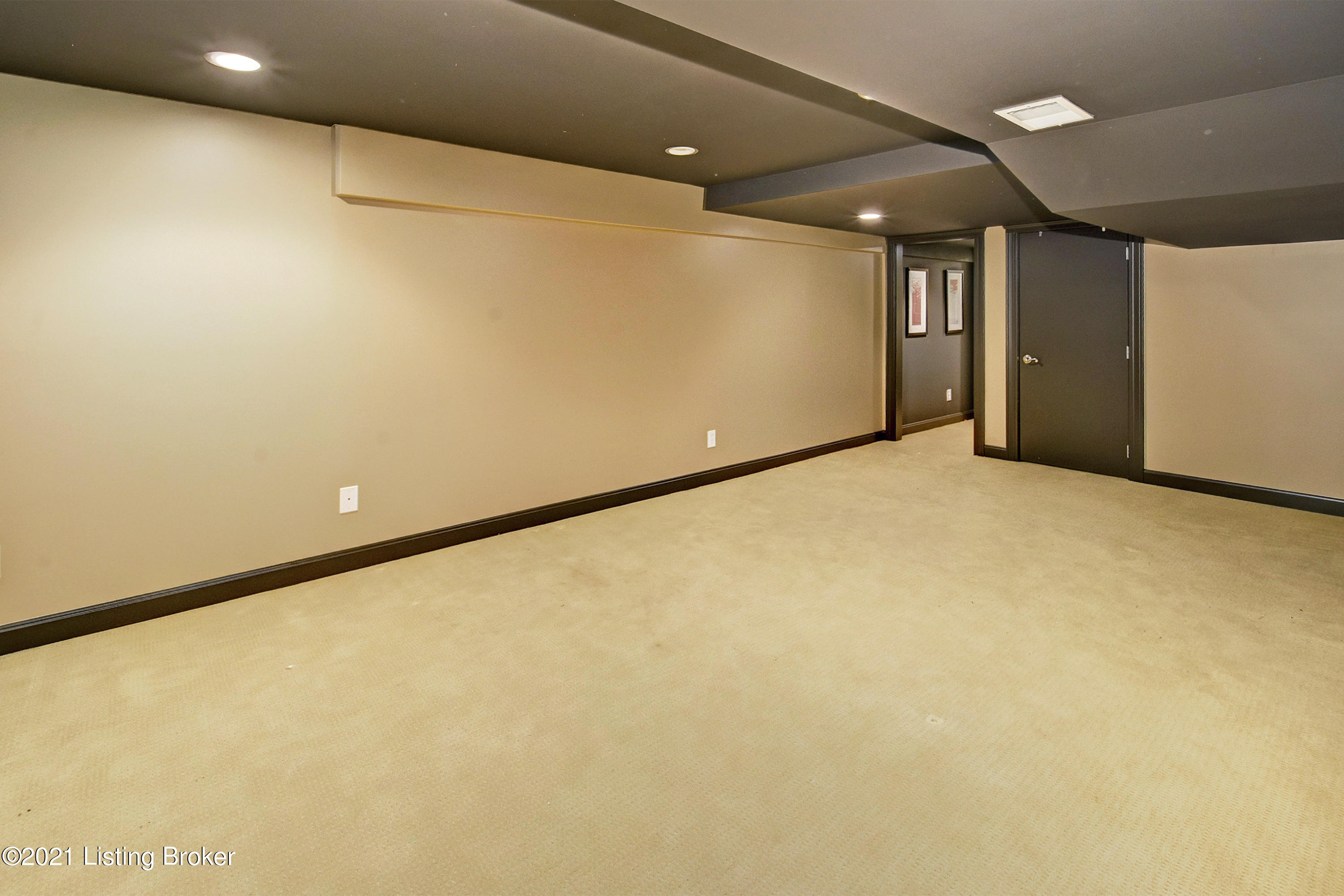 1809 Round Ridge Road Louisville, KY 40207 - Photo 18 of 22 This room can be used as a bedroom/exercise room/office! There is a remodeled full bathroom attached here!